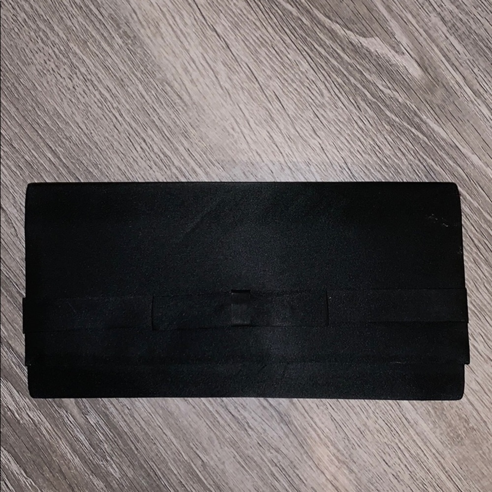 Black clutch with adjustable strap